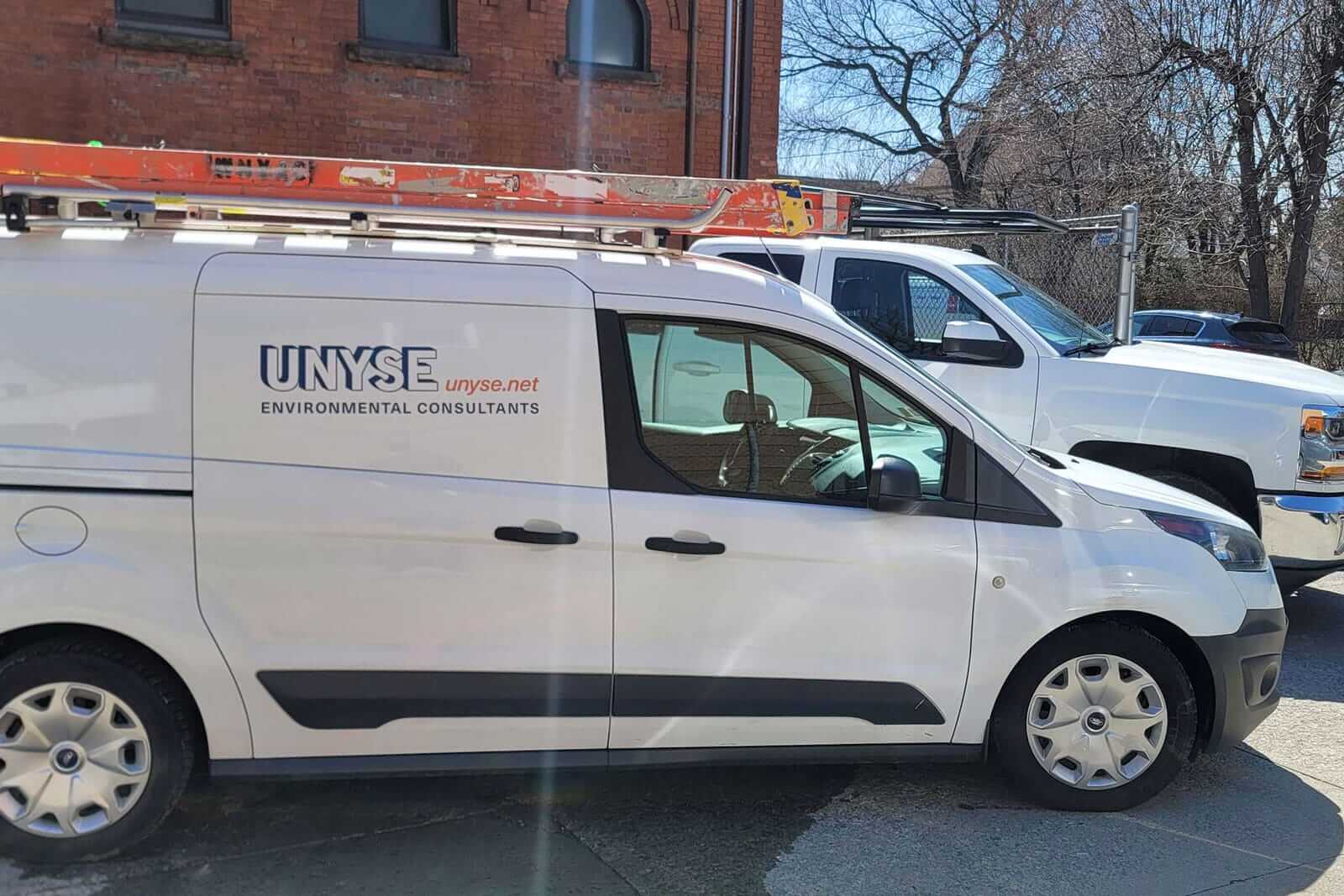 Environmental consultants' van with UNYSE branding.