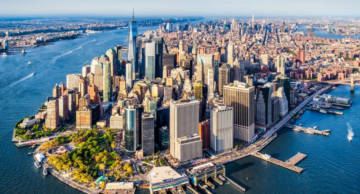 Aerial view of downtown Manhattan skyline and river.
